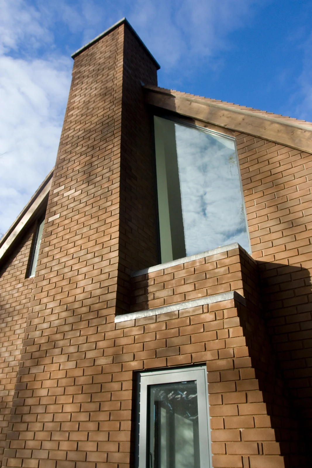 Brickwork and roof detail at October House