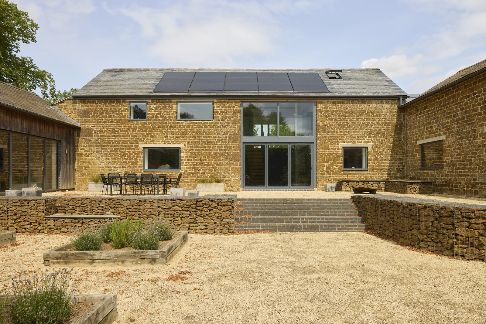 Courtyard elevation and terrace at Rough Hill Farm